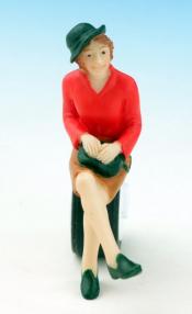 Frau sitzend mit Hut (rot)